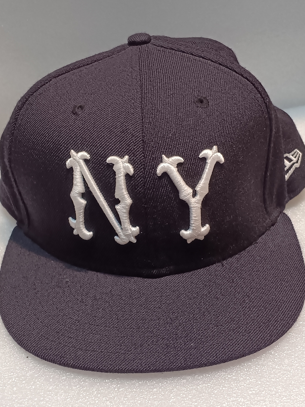 New Era Black Hat with White NY Embroidery